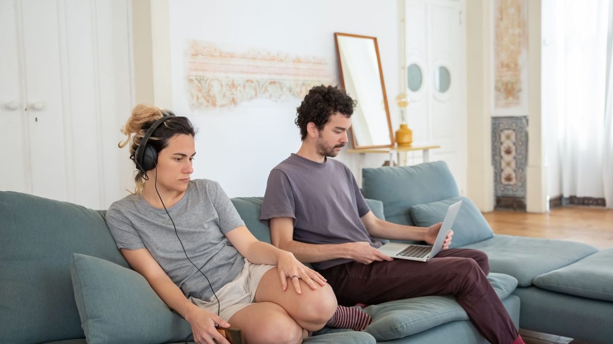 Couple sitting apart