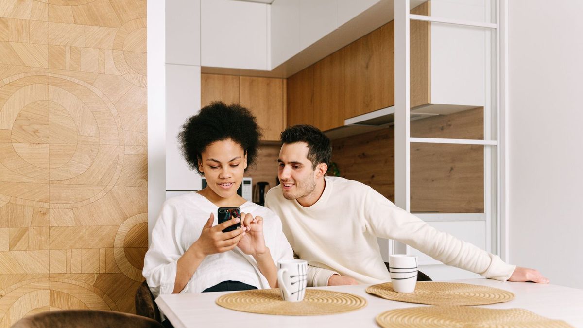 Couple comparing apps