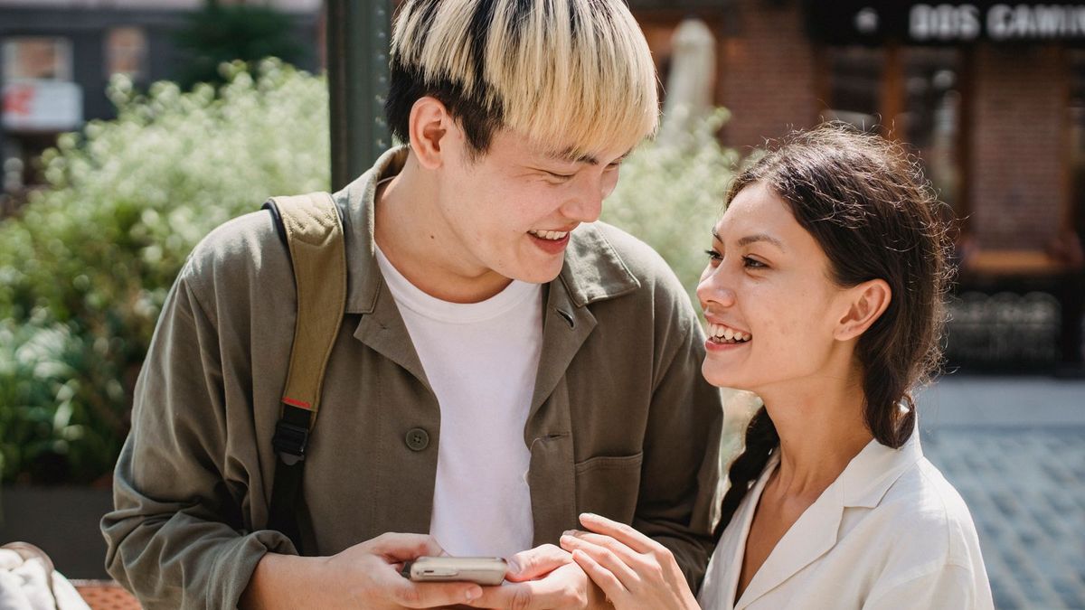 Happy couple phone