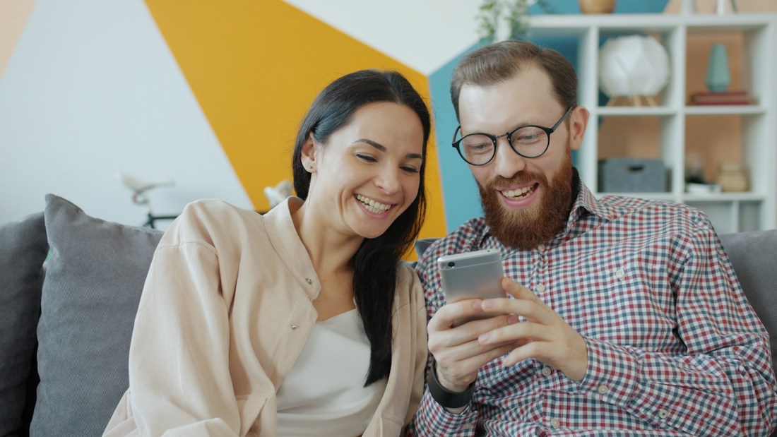 Couple using phone