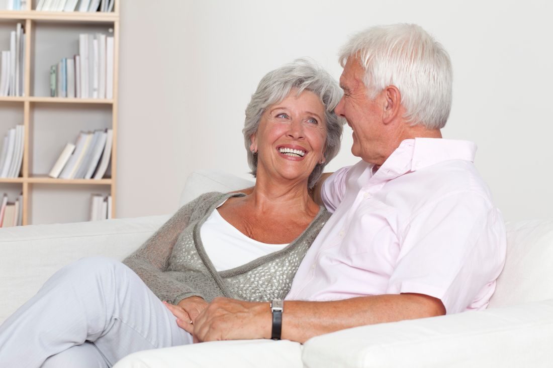 Older couple sofa