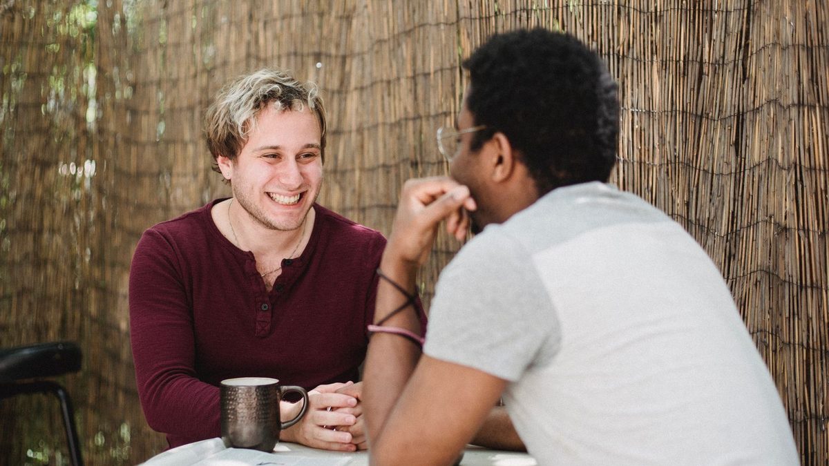 Two men laughing