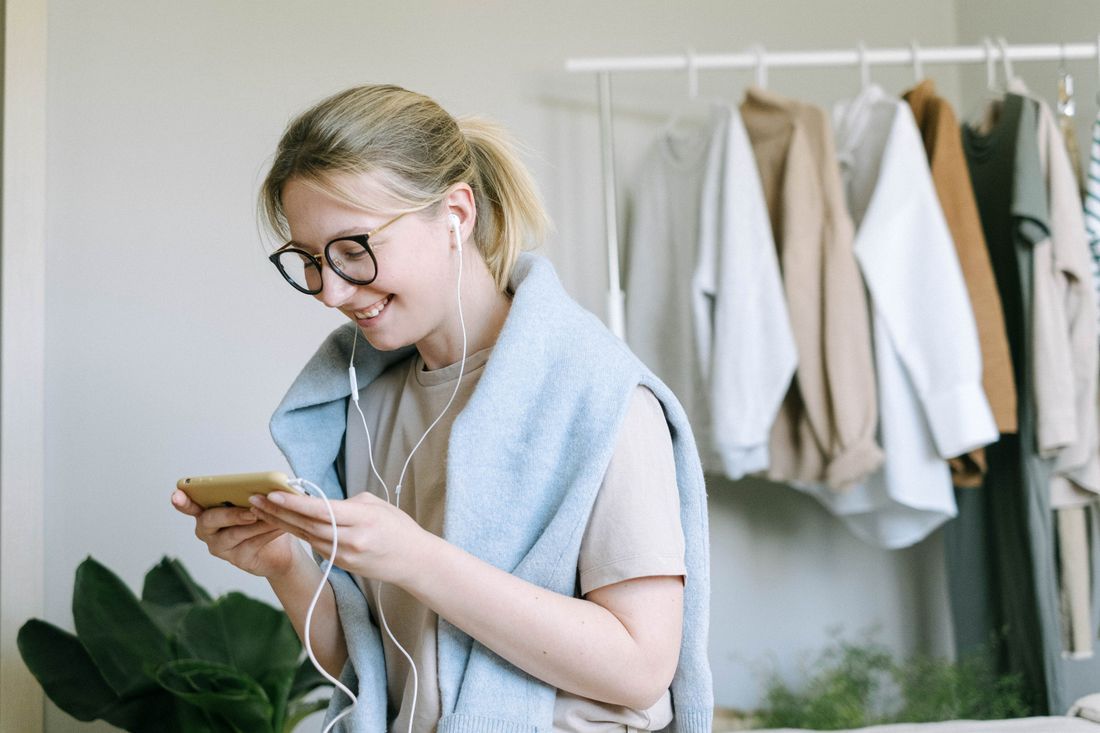 Woman using earphones